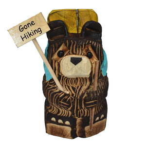 Wood Carved Hiking Bear Holding a Sign