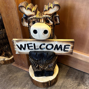 Wood Carved Moose Holding a Sign