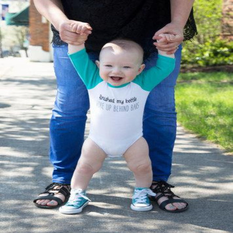 Infant Onesie Behind Bars